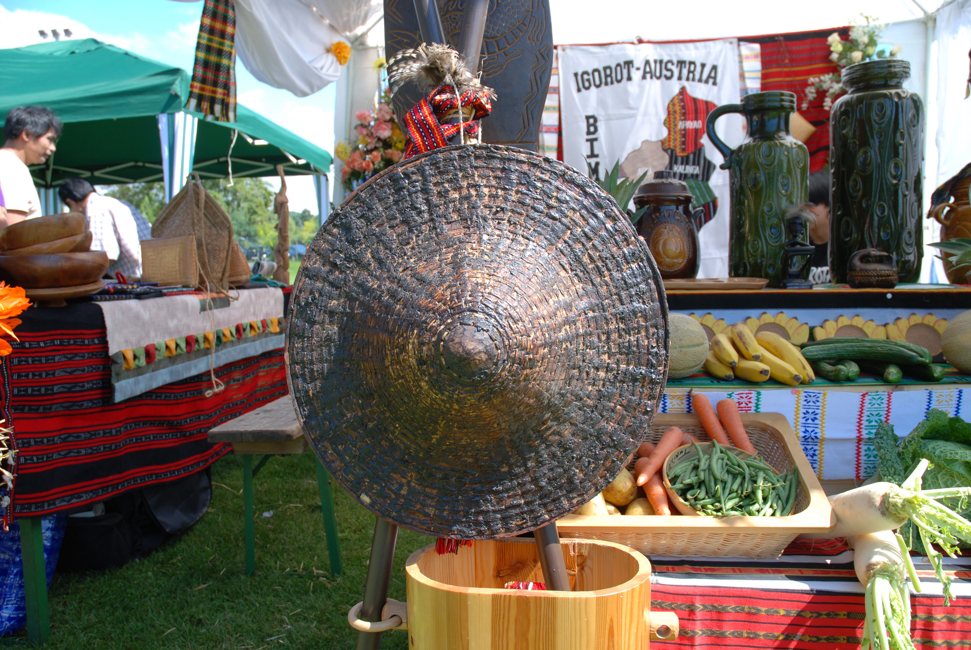 Igorot booth during a fiesta, showcasing handcrafted products including pasiking