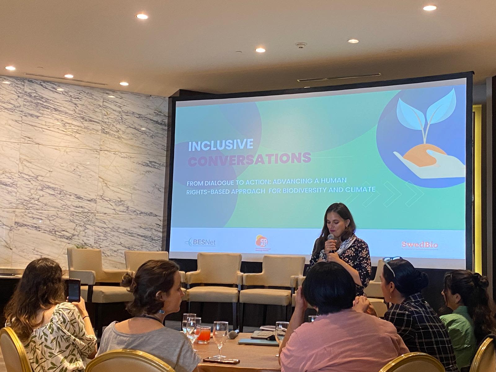 A speaker addresses participants during the “Inclusive Conversations” event on advancing a human rights-based approach for biodiversity and climate.