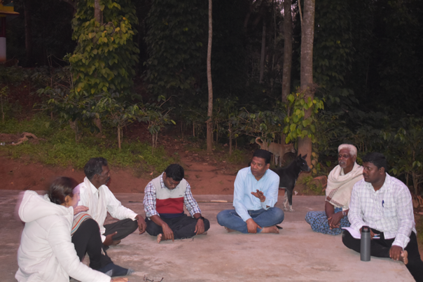 The researchers meeting with Soligas elders