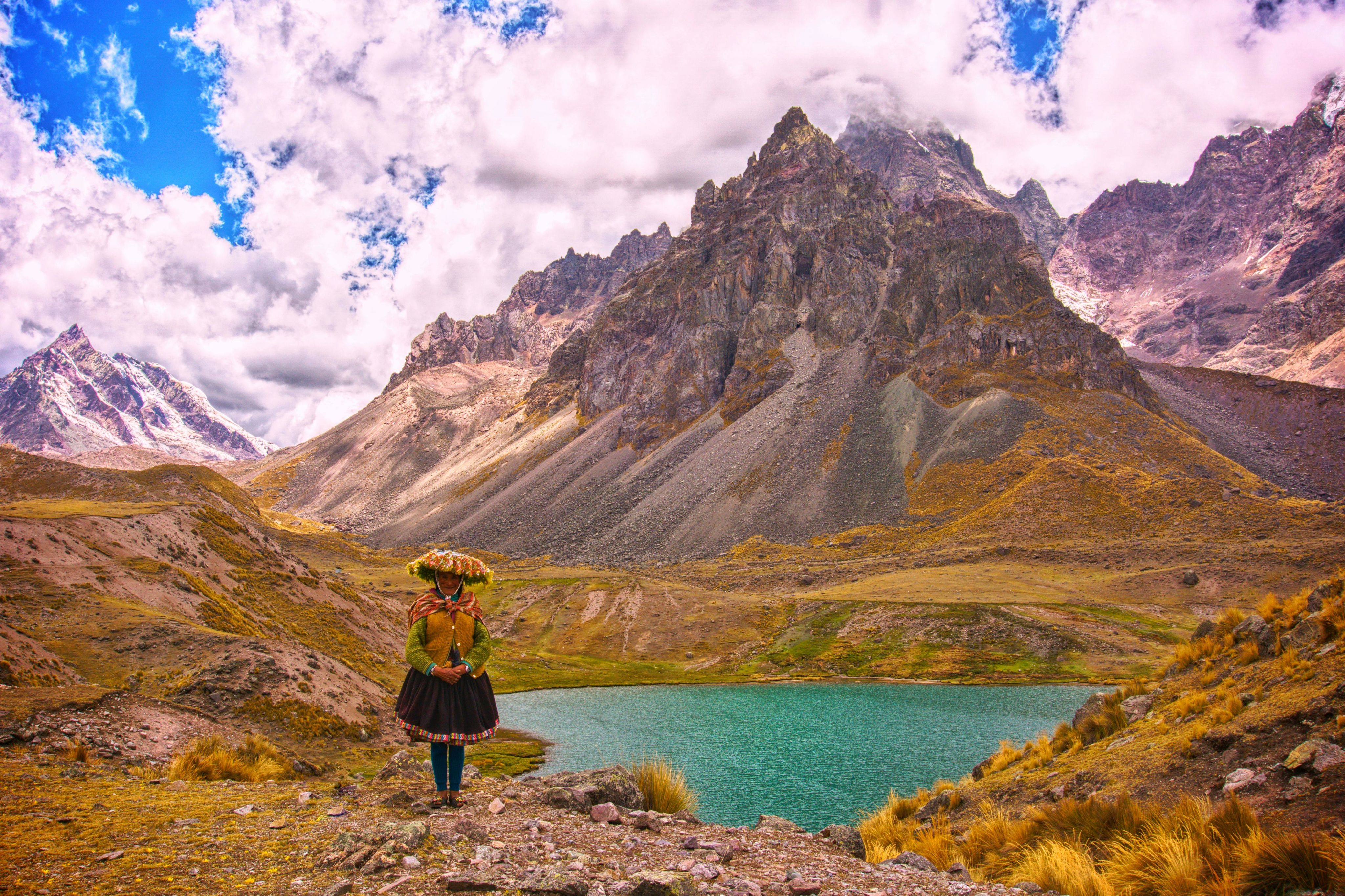 woman in traditional clothing, standing at the lake