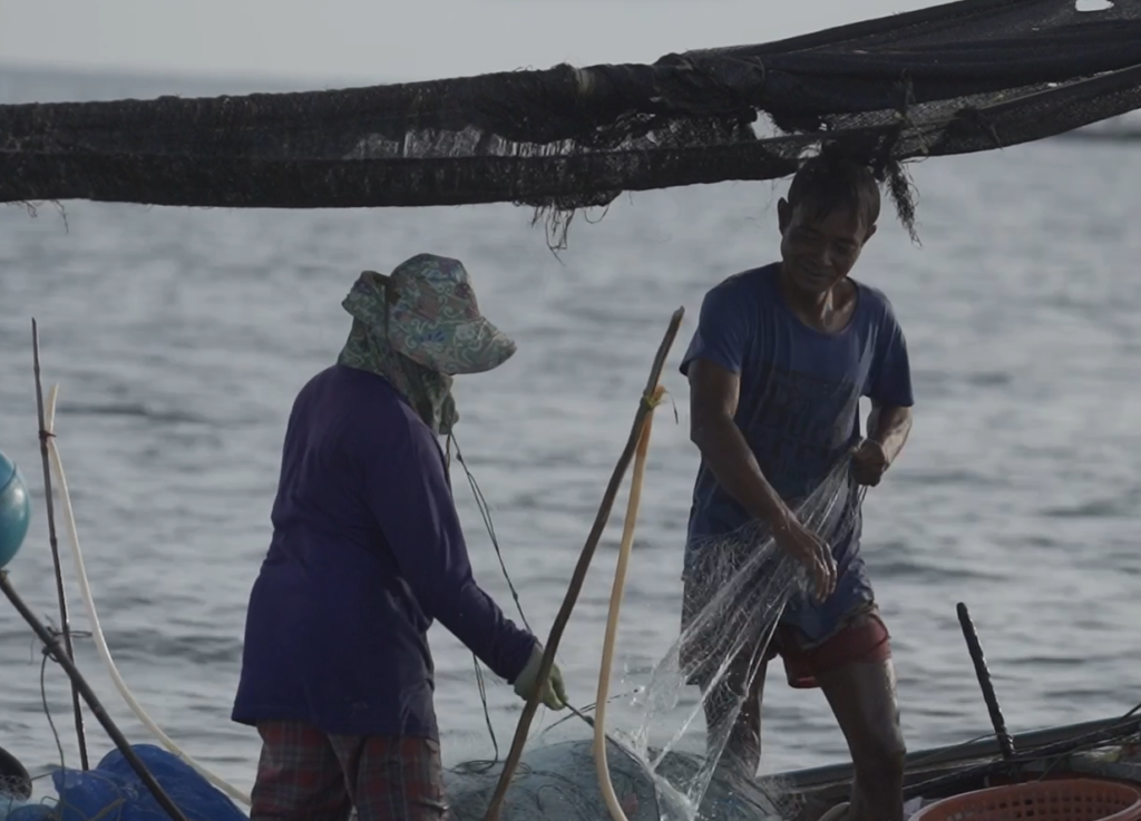 Fisherfolks on a boat
