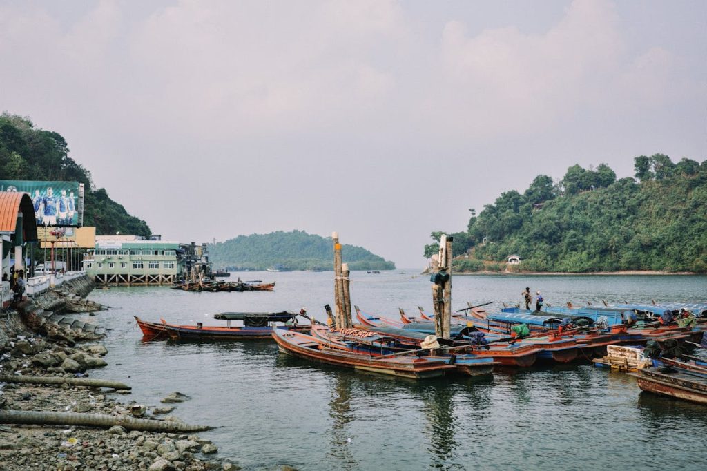 boats moored in village harbor