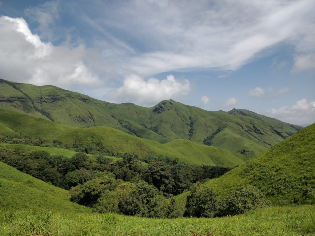 lush green hills of Kudremukha in Karnataka, offering breathtaking natural beauty and tranquility